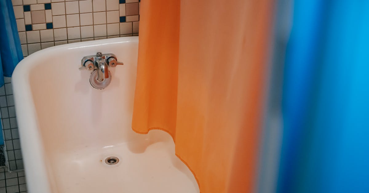 Does increasing your Insight unlock new items to buy from the Insight Bath Messenger? - From above of clear white bath with steel faucet with hanging blue and orange curtain located in bathroom with tiled walls Does increasing your Insight unlock new items to buy from the Insight Bath Messenger? - From above of clear white bath with steel faucet with hanging blue and orange curtain located in bathroom with tiled walls