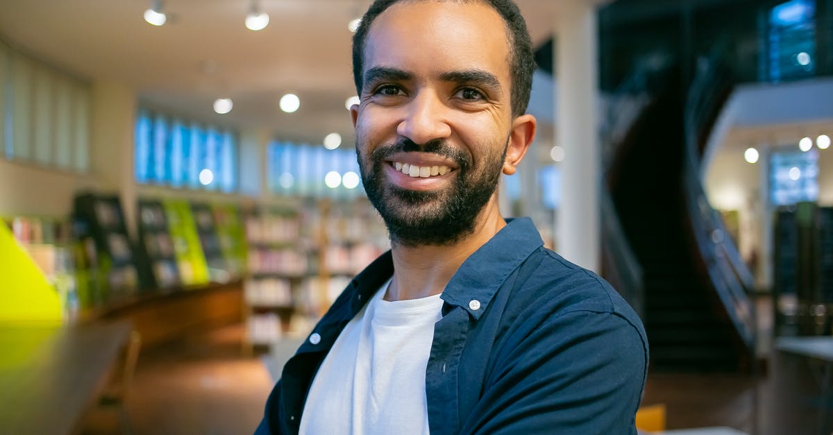 Does inserting the network scanning holotape into the institute terminal make the institute hostile later on? - Smiling ethnic bearded student with toothy smile standing against bookshelves in library in college Does inserting the network scanning holotape into the institute terminal make the institute hostile later on? - Smiling ethnic bearded student with toothy smile standing against bookshelves in library in college