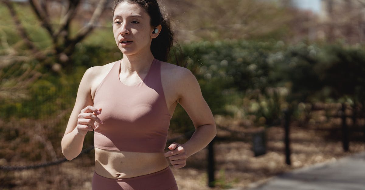 Does invincibility provide any sort of speed boost? - Woman in Pink Tank Top and Brown Shorts Standing on Road
