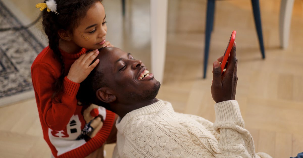 Does Jax's Grandmaster's Might passive trigger Deathfire Touch? - Dad and Daughter Looking at a Red Smartphone Does Jax's Grandmaster's Might passive trigger Deathfire Touch? - Dad and Daughter Looking at a Red Smartphone