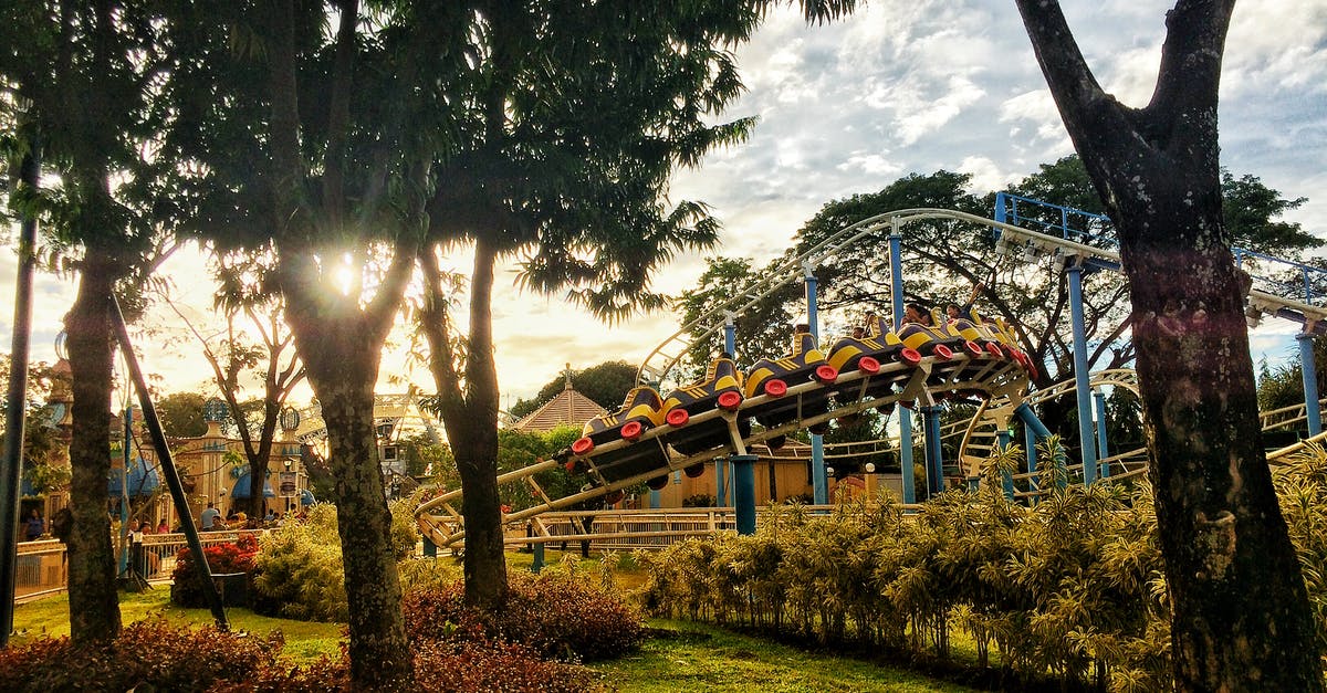 Does Mowing the Grass have benefits beyond aesthetics in RollerCoaster Tycoon? - Roller Coaster Ride Near Trees Under Blue Clouds Does Mowing the Grass have benefits beyond aesthetics in RollerCoaster Tycoon? - Roller Coaster Ride Near Trees Under Blue Clouds