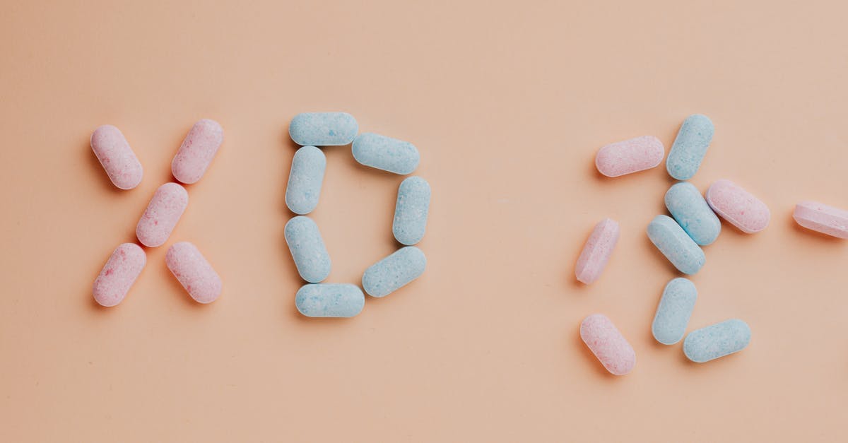 Does Nova spoil Legacy? - Top view composition of yummy pink and blue candy dots placed on pink background Does Nova spoil Legacy? - Top view composition of yummy pink and blue candy dots placed on pink background
