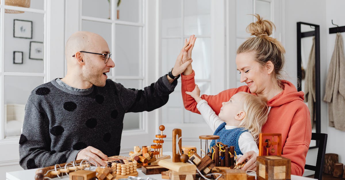 does origin re-download games for each account? - Free stock photo of child, family, indoors