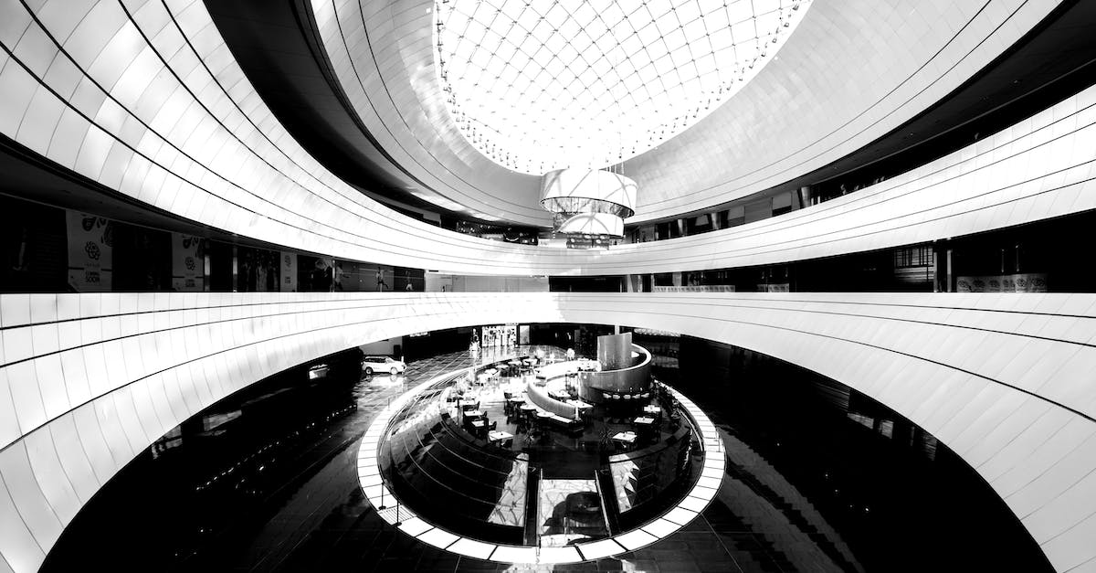 Does Packet Sniffer work inside a Titan? - Grayscale Photo of People Walking on Tunnel