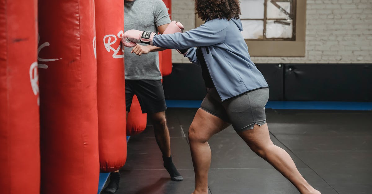 Does pokemon size (XS/Normal/XL) influence attack power? [duplicate] - Ethnic instructor practicing boxing with black woman