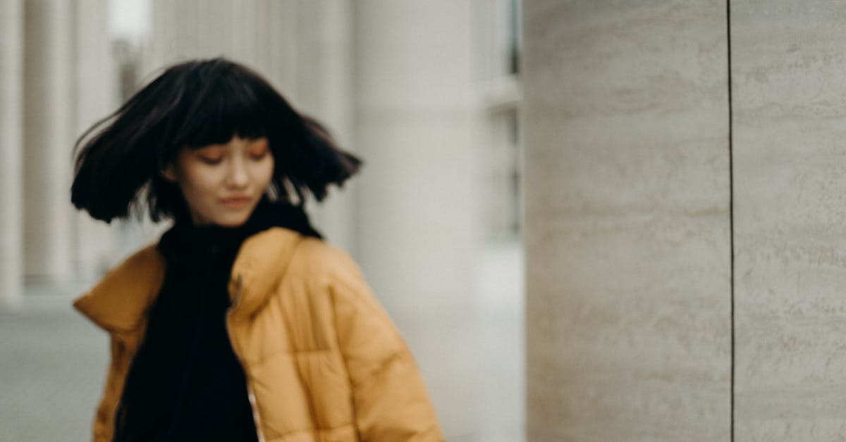 Does Pretty Fly count towards Lord of the Flies transformation? - Selective Focus Photo of Woman in Mustard Yellow Bubble Jacket Posing with Her Eyes Closed