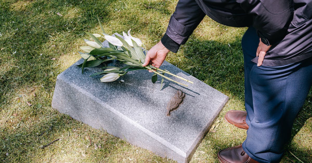 Does putting a key in a capsule mean you can hack more? - Free stock photo of adult, black clothes, cemetery