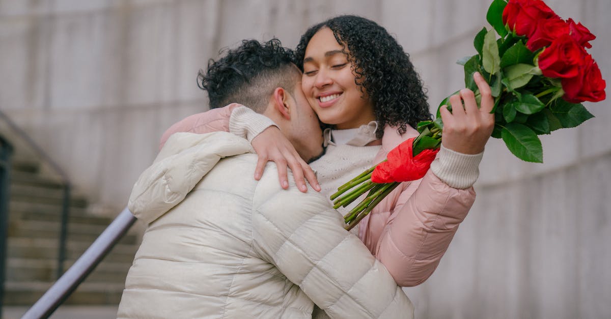 Does "Happy Birthday Diablo III" Buff affect Kadala? - Loving couple with bunch of roses embracing with closed eyes in city