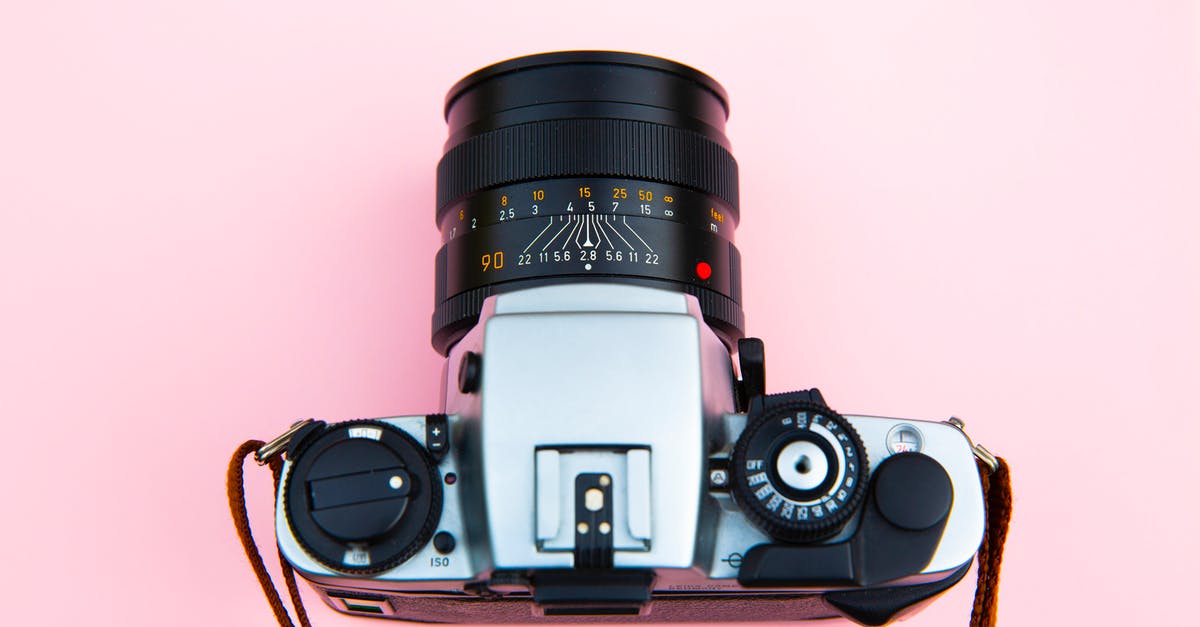 Does Rangefinder do anything on bows besides increase the zoom? - Black and Silver Camera on Brown Wooden Table