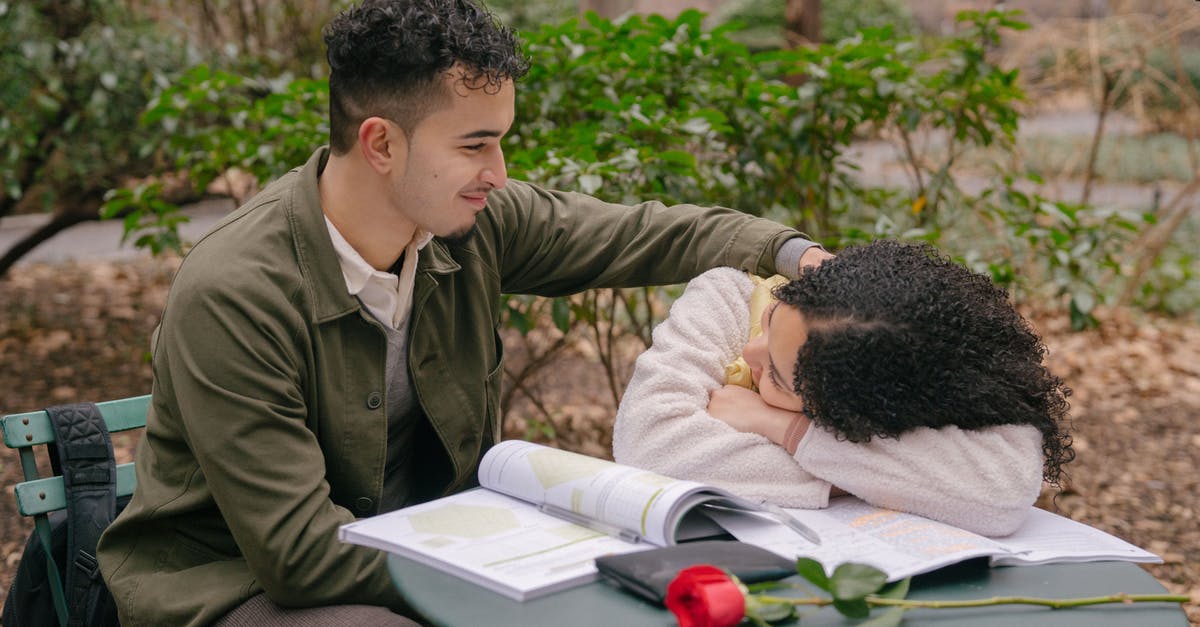 Does Red Alert 2 support TCP? - Hispanic happy boyfriend with girlfriend at table with rose