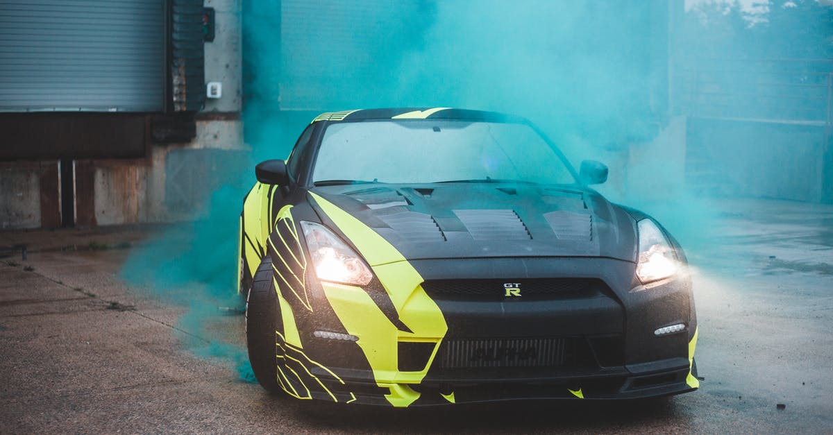 Does smoke grenade triggers alert or alarm? - Luxury car in green smoke