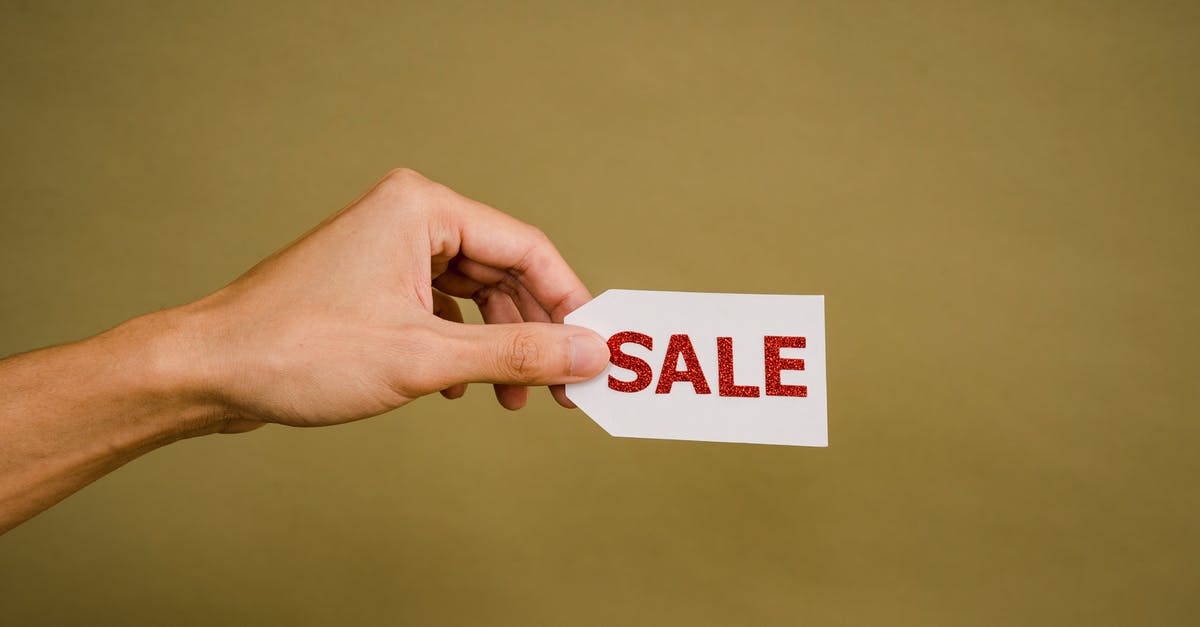 Does Steam always show third-party DRM on the store page? - Crop faceless person demonstrating sign Sale