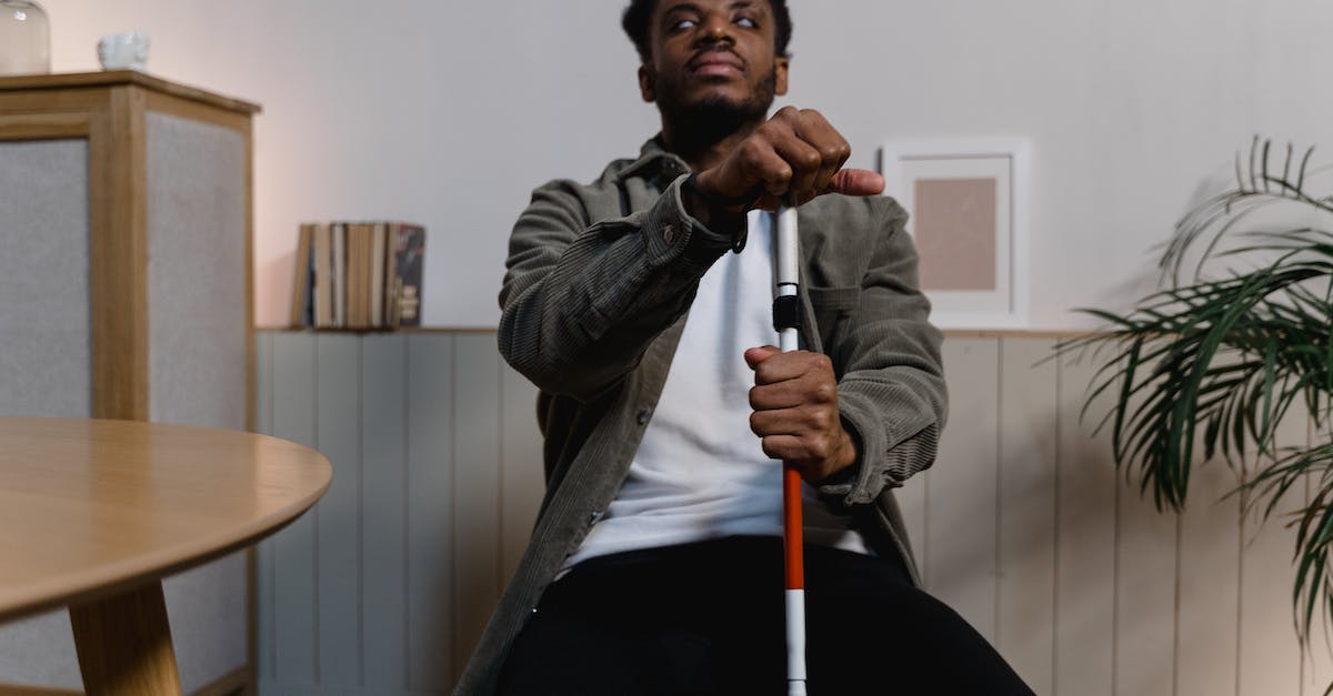 Does Teemo Blind blocks Darius Ultimate? [duplicate] - A Man Holding a Walking Stick