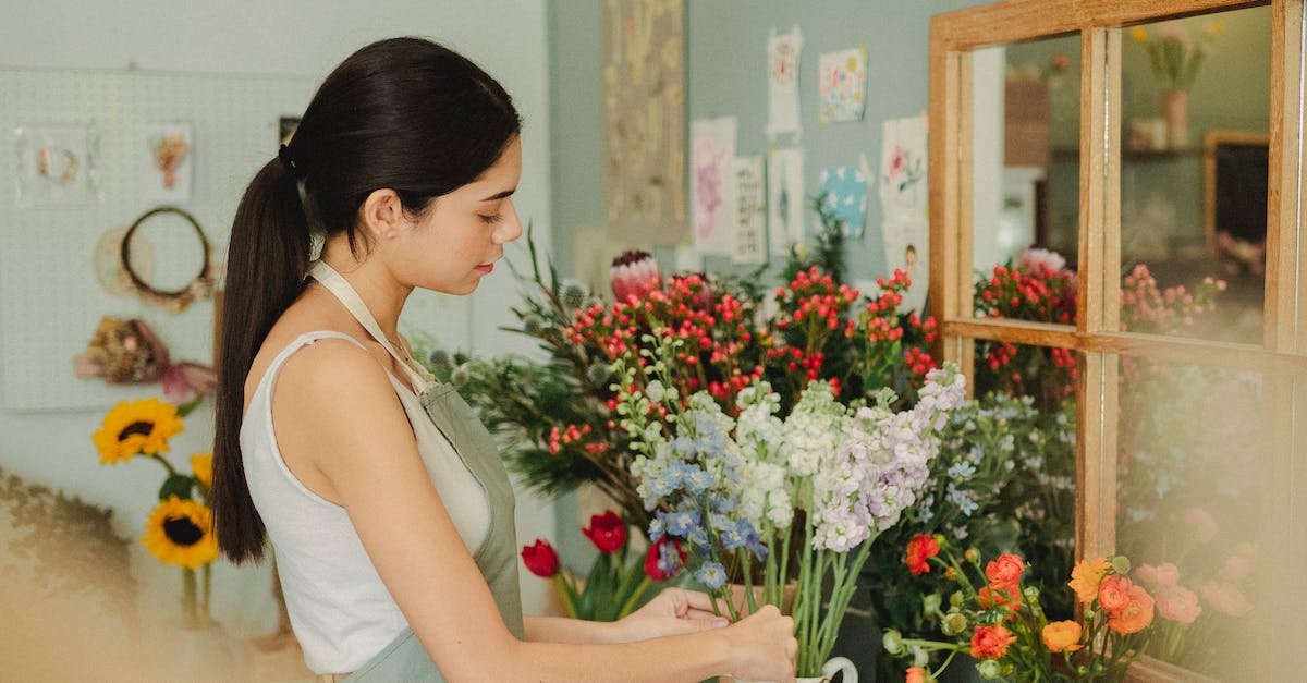 Does the Avatar Logbook store unequipped skills? - Woman preparing floral bouquet in floral shop