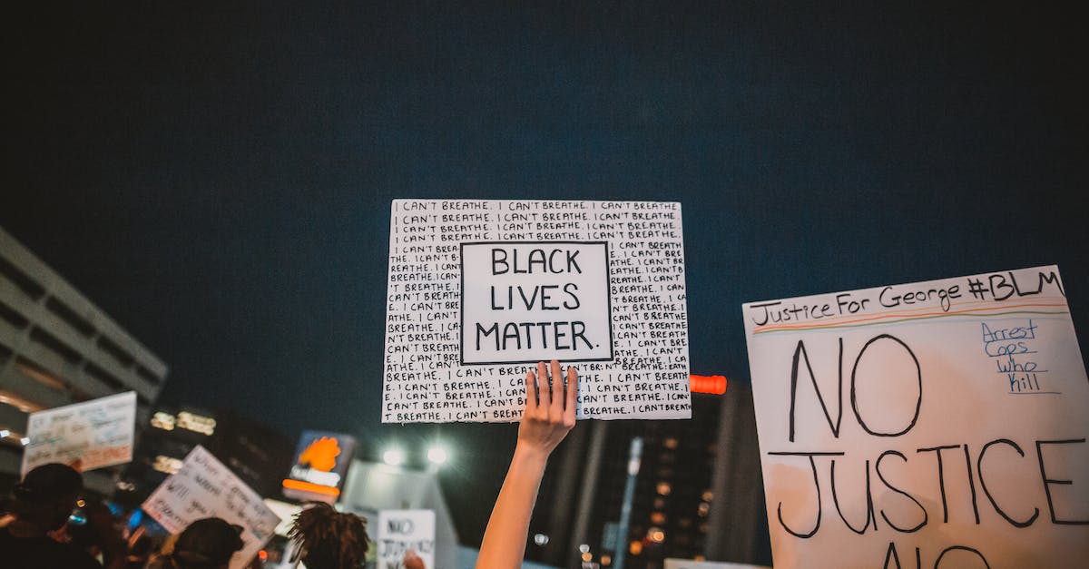 Does the campaign screen still show a higher difficulty completed if I start a new campaign on a lower setting? - Crop anonymous person holding banner with black lives matter inscription during massive demonstrations on city street at night