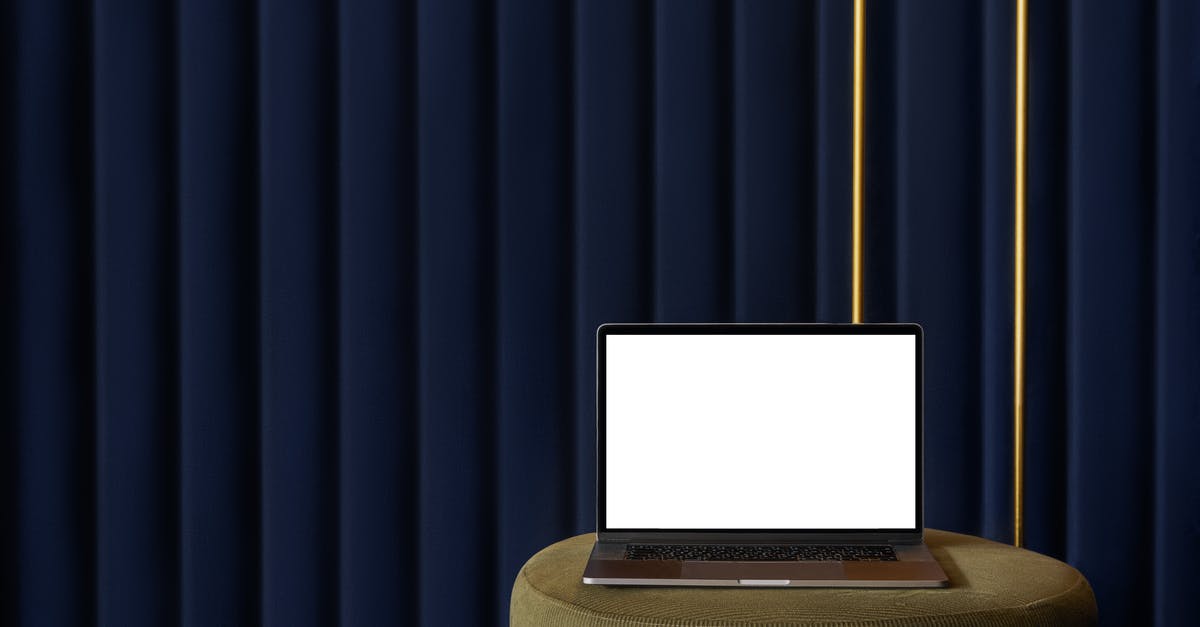 Does the F3 button work on PC? [duplicate] - Contemporary netbook with empty screen for convenient freelance work against blue striped wall