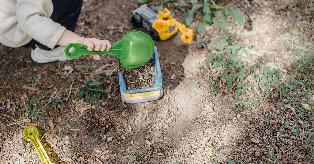 Does the Galnet news play a part in the game? - Little kid playing with plastic colourful toys in yard