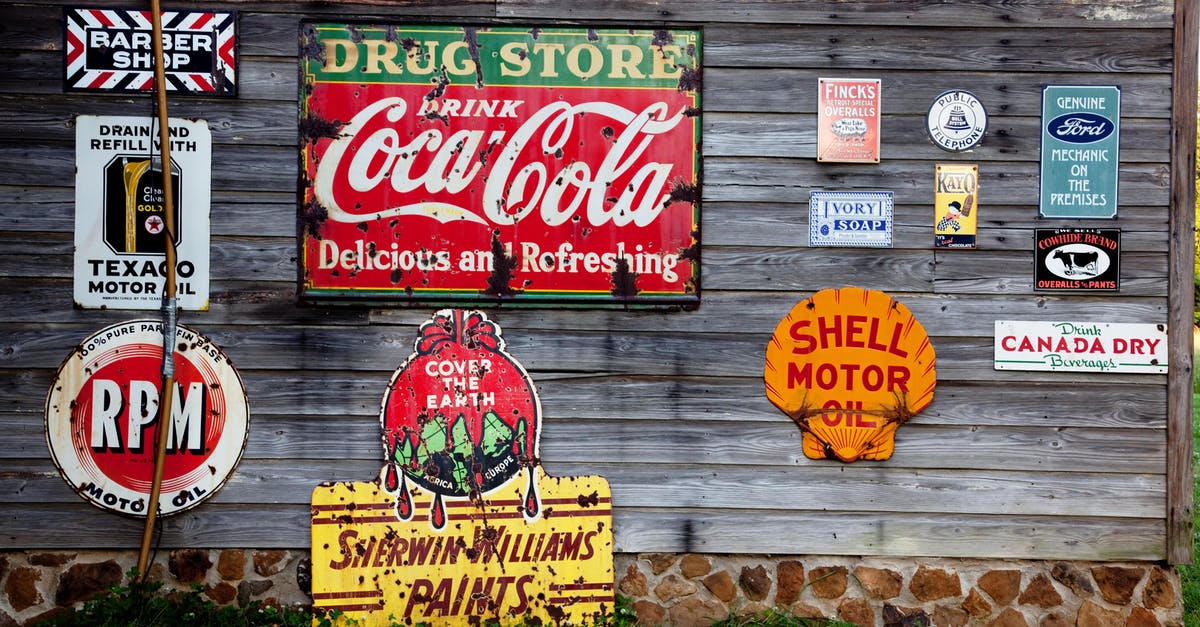 Does the Nuka-Cola bottler actually generate nuka cola? - Drug Store Drink Coca Cola Signage on Gray Wooden Wall