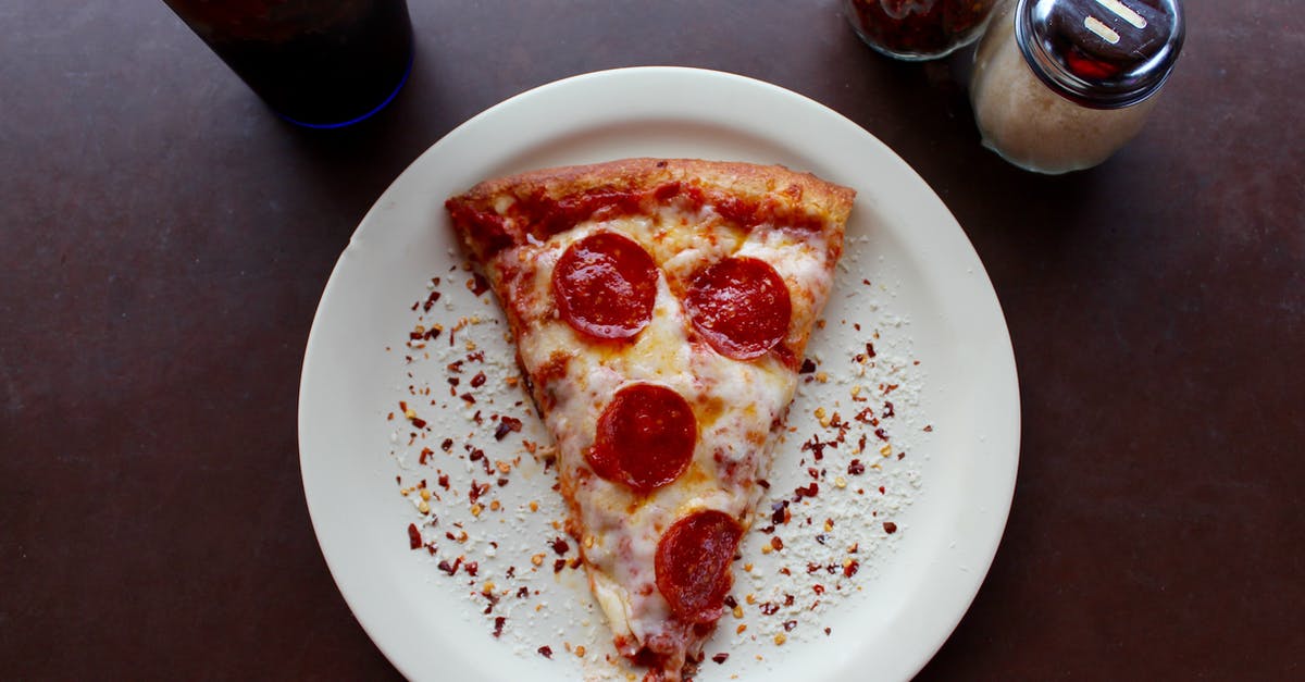 Does the Nuka-Cola bottler actually generate nuka cola? - Sliced Pepperoni Pizza on White Ceramic Plate