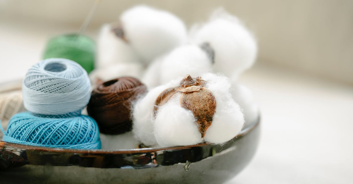 Does the quality of white items give different craft results? - Various balls of multicolored threads in bowl