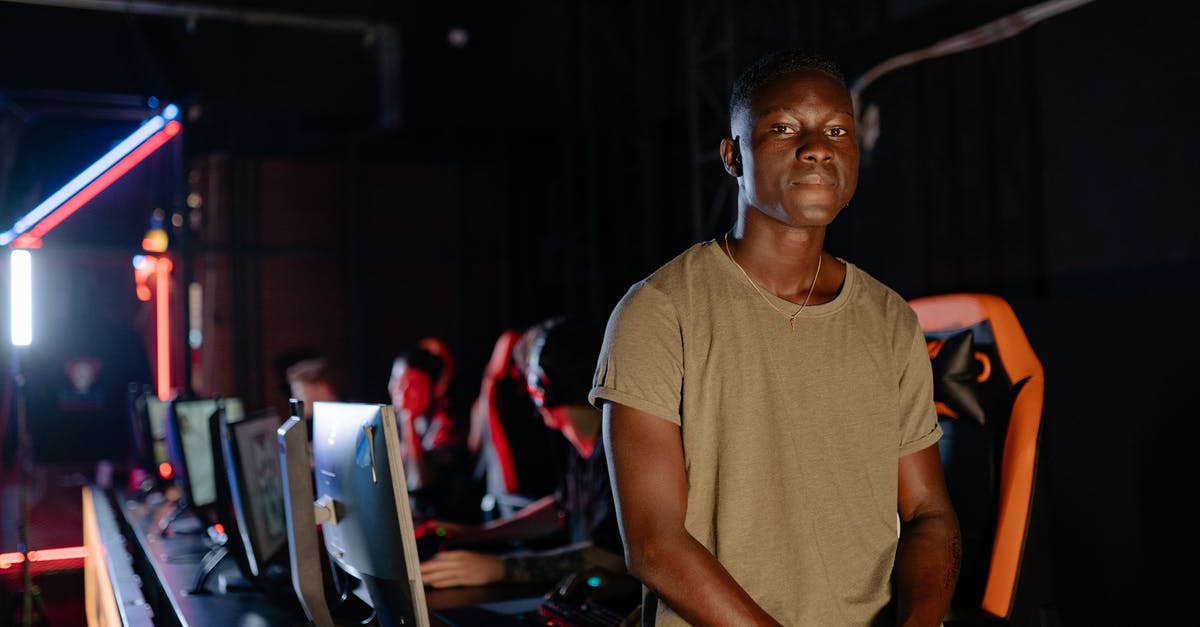 Does the resolution of my PC monitor affect performance on Steam Link? - Man in Brown Crew Neck T-shirt Sitting on the Edge of the Gaming Table