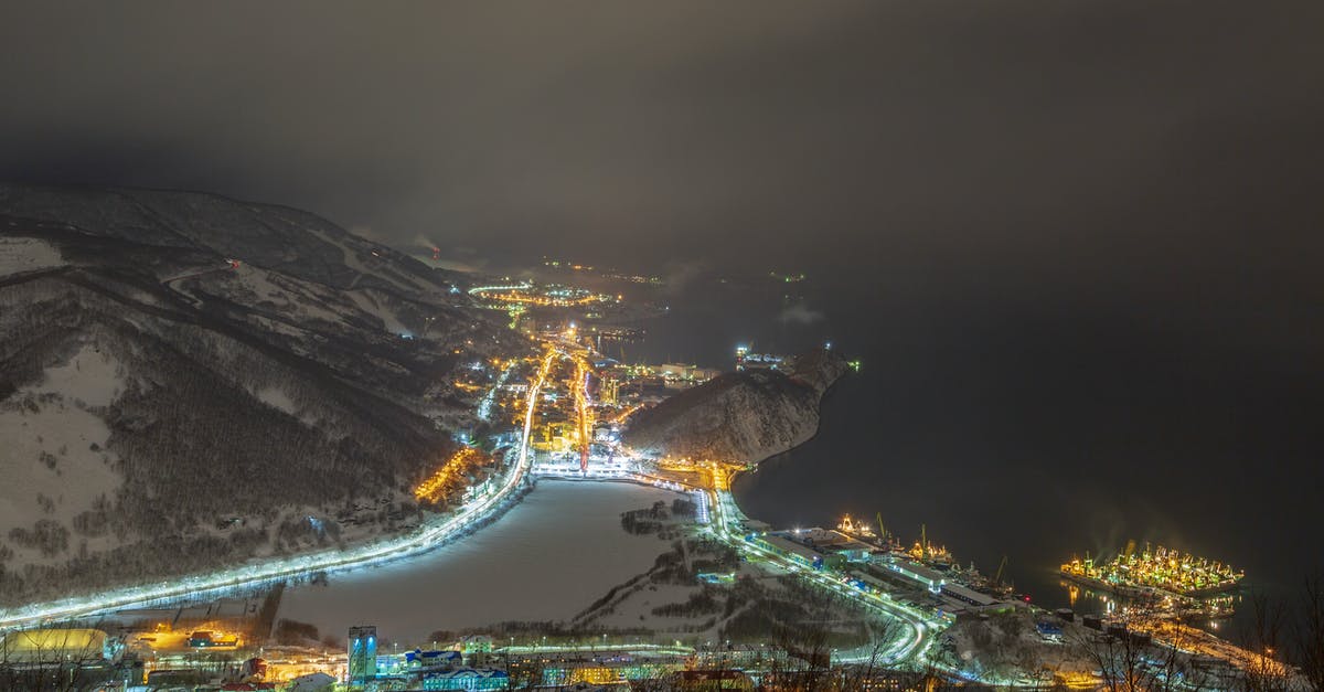 Does the (Small) Ring of Glow prevent me from catching Night Fish? - From above of glowing night town with snowy hills in heavy snowfall at night Does the (Small) Ring of Glow prevent me from catching Night Fish? - From above of glowing night town with snowy hills in heavy snowfall at night