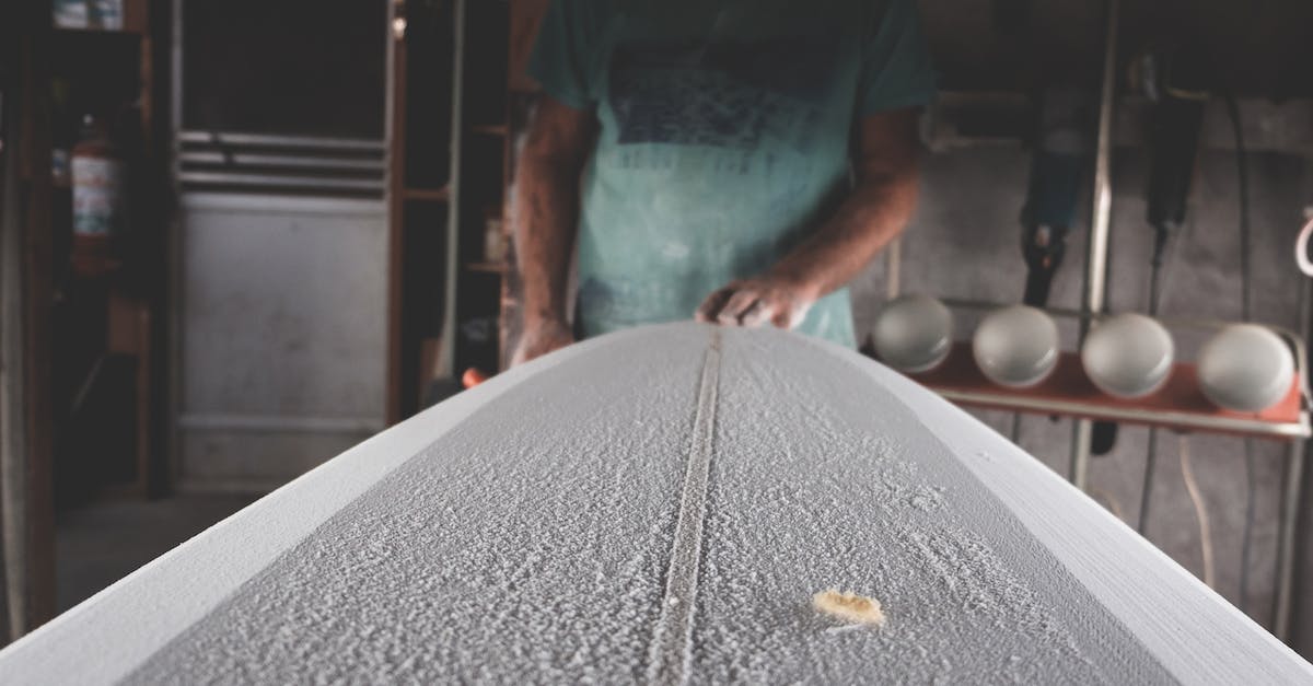 Does the SPECIAL max out at 10 or can I put clothes on to make it 10+? [duplicate] - Crop artisan shaping surfboard in workshop