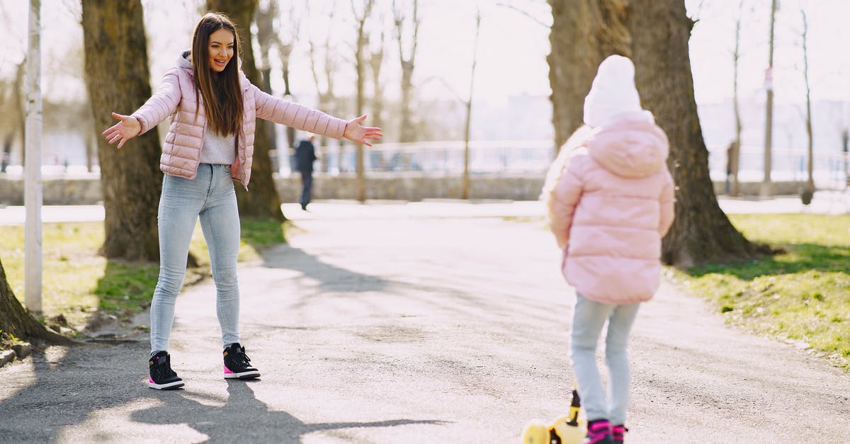 Does the steam copy of Rocket League have implicit support for PS4 Controllers? - Full body little girl riding kick scooter on alley in park while mother standing with hands apart for support in sunny day Does the steam copy of Rocket League have implicit support for PS4 Controllers? - Full body little girl riding kick scooter on alley in park while mother standing with hands apart for support in sunny day