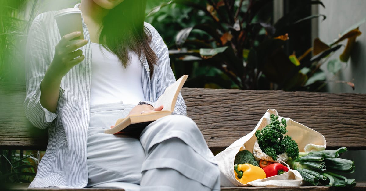 Does the warmonger penalty go down over time? - Crop happy Asian woman reading book on bench in garden Does the warmonger penalty go down over time? - Crop happy Asian woman reading book on bench in garden