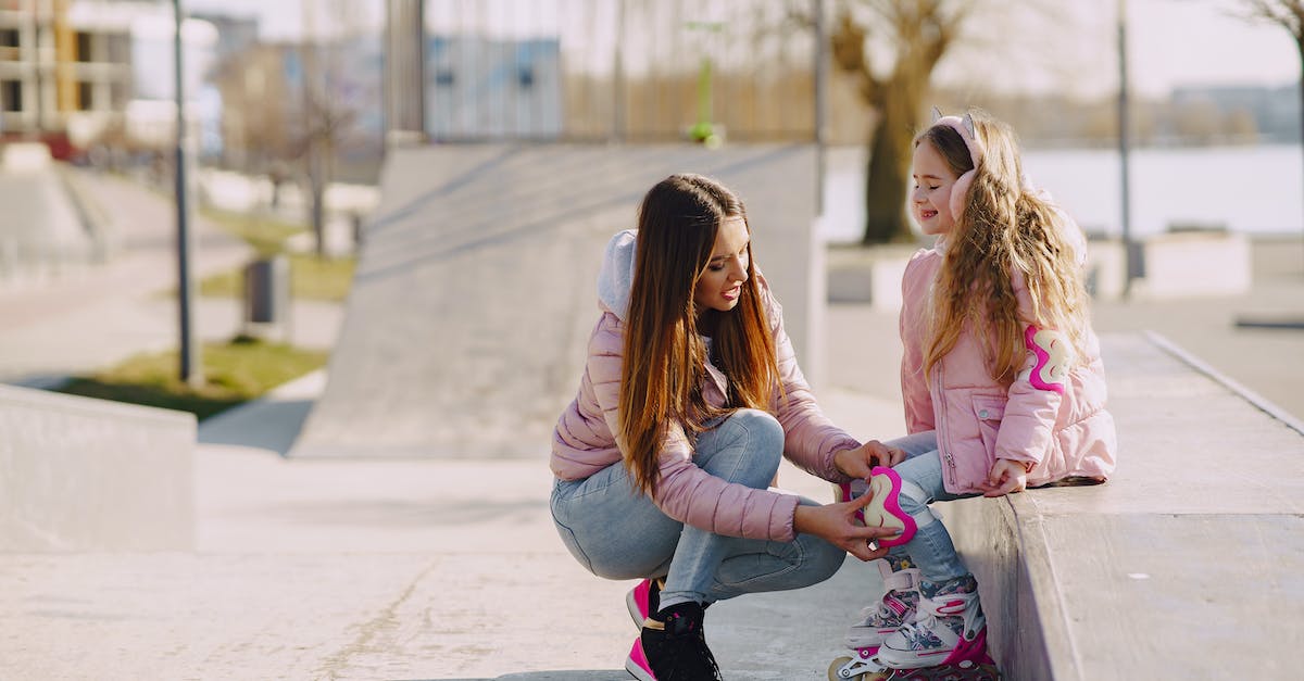 Does the Wii U game pad actually detect breath? - Mother and daughter in warm outerwear on skate playground before roller skating