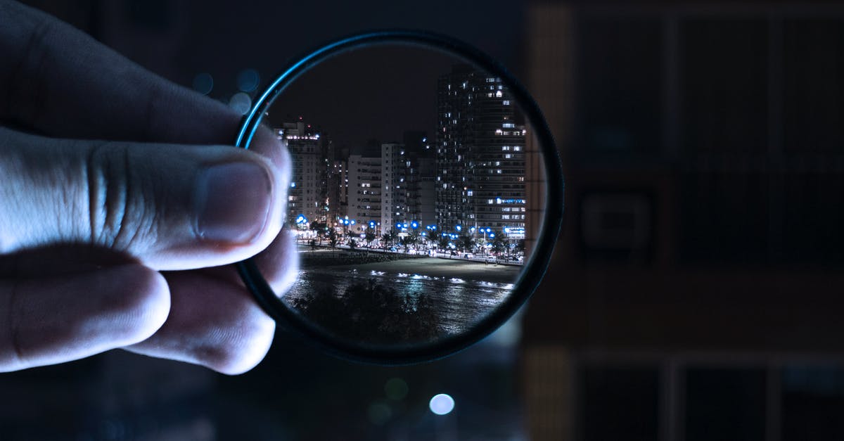 Does the zoom affect the amount of pokémon encountered? - Person Holding Magnifying Glass