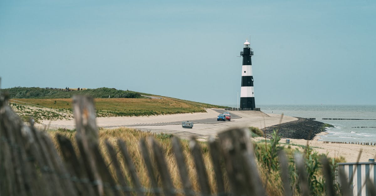Does transport building reduce traffic on roads? - Solitude lighthouse on coastline at sea Does transport building reduce traffic on roads? - Solitude lighthouse on coastline at sea
