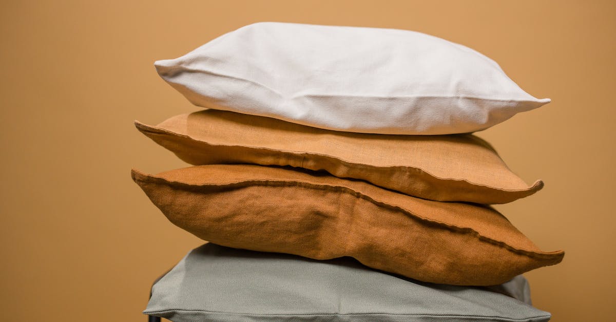 Does two pronged attack stack with Row enhance? - Stack of different colorful pillows folded and placed in stack on chair isolated on dark beige background