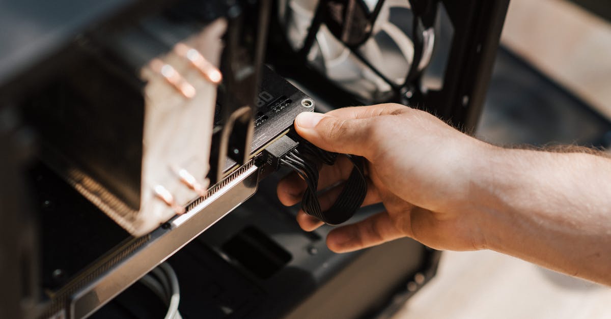 Does using an HDMI splitter introduce input lag? - Crop faceless man inputting cables in system unit Does using an HDMI splitter introduce input lag? - Crop faceless man inputting cables in system unit