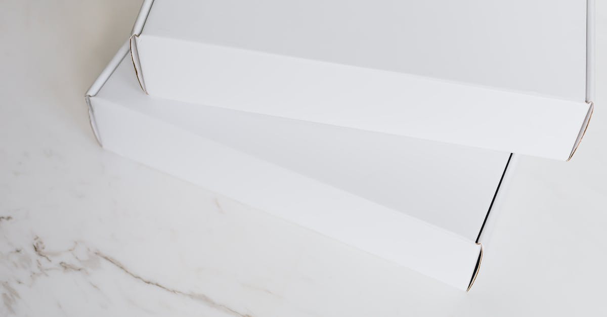 Does your storage carry over difficulties? - Set of white carton packages on marble surface