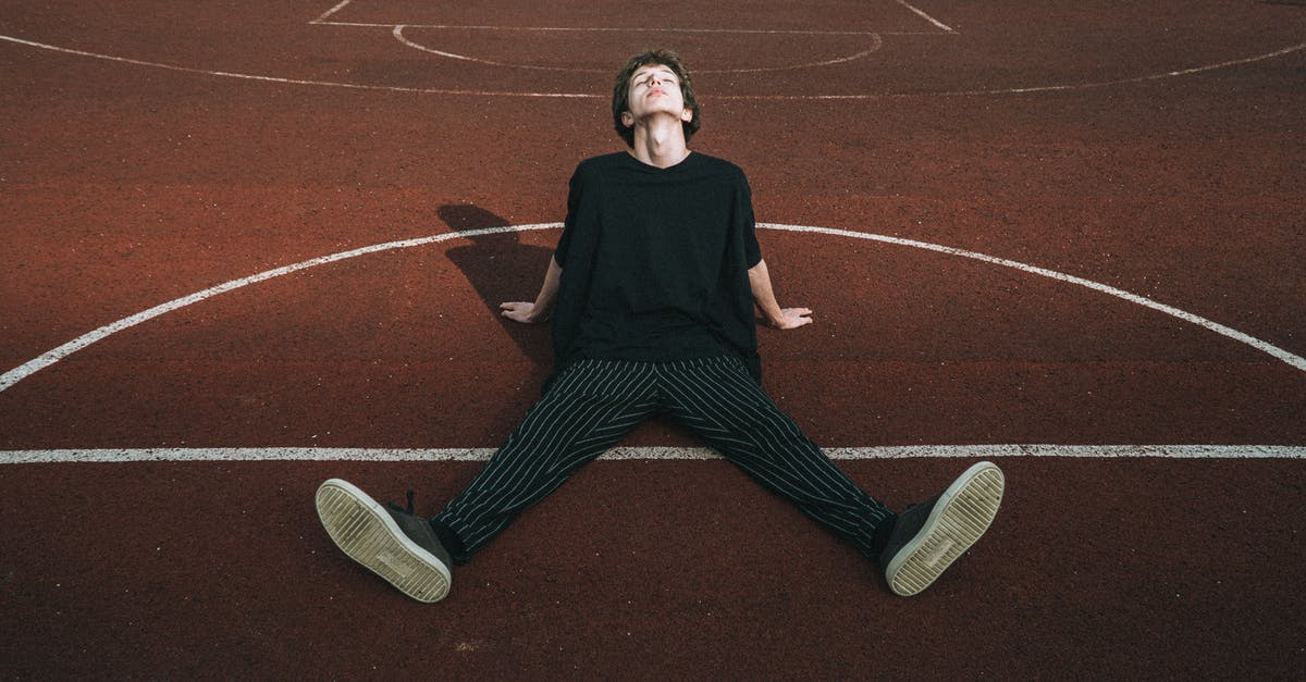 Don't Starve marking on ground question - Male teen in striped trousers leaning with hands on recreation ground on sunny day Don't Starve marking on ground question - Male teen in striped trousers leaning with hands on recreation ground on sunny day