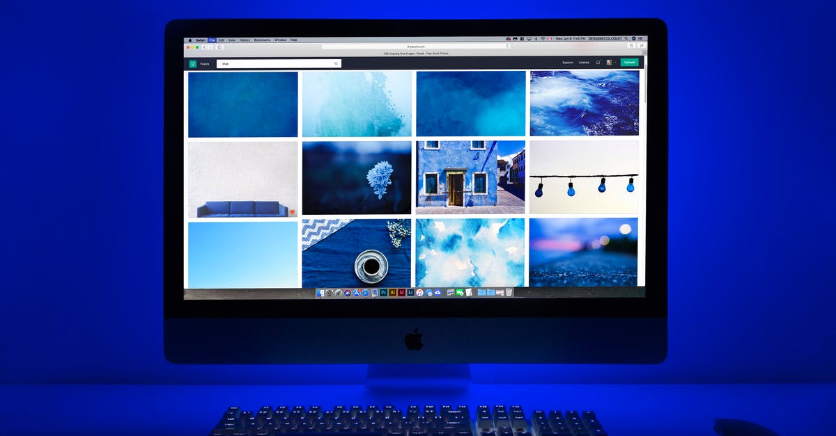 Doom blue screen of death (BSOD) - Silver Imac Turned on Displaying Different Photos