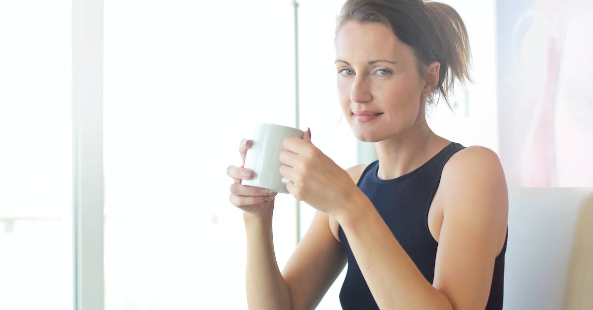 Dota-2 Profile on Shared PC - Woman in Black Tank Top Holding White Ceramic Cup Dota-2 Profile on Shared PC - Woman in Black Tank Top Holding White Ceramic Cup