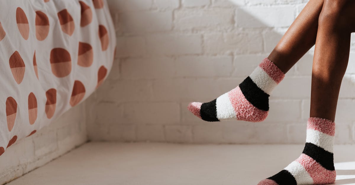 DOTA 2: Minimap crosses to another shape - Faceless ethnic woman in striped socks in bedroom