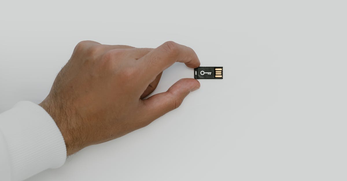 Download legit copy of Fifa 16 without activation key - Hand Holding a USB Flash Drive Download legit copy of Fifa 16 without activation key - Hand Holding a USB Flash Drive