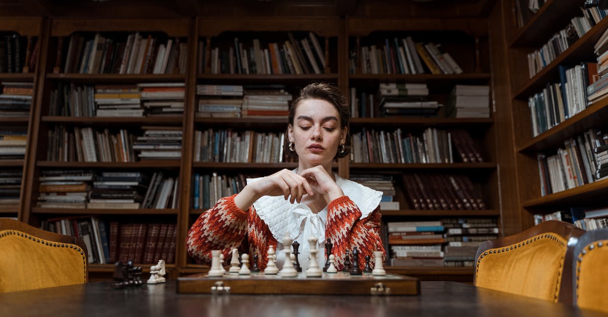 Download Steam Game to Library - A Woman Playing Chess in a Library Download Steam Game to Library - A Woman Playing Chess in a Library