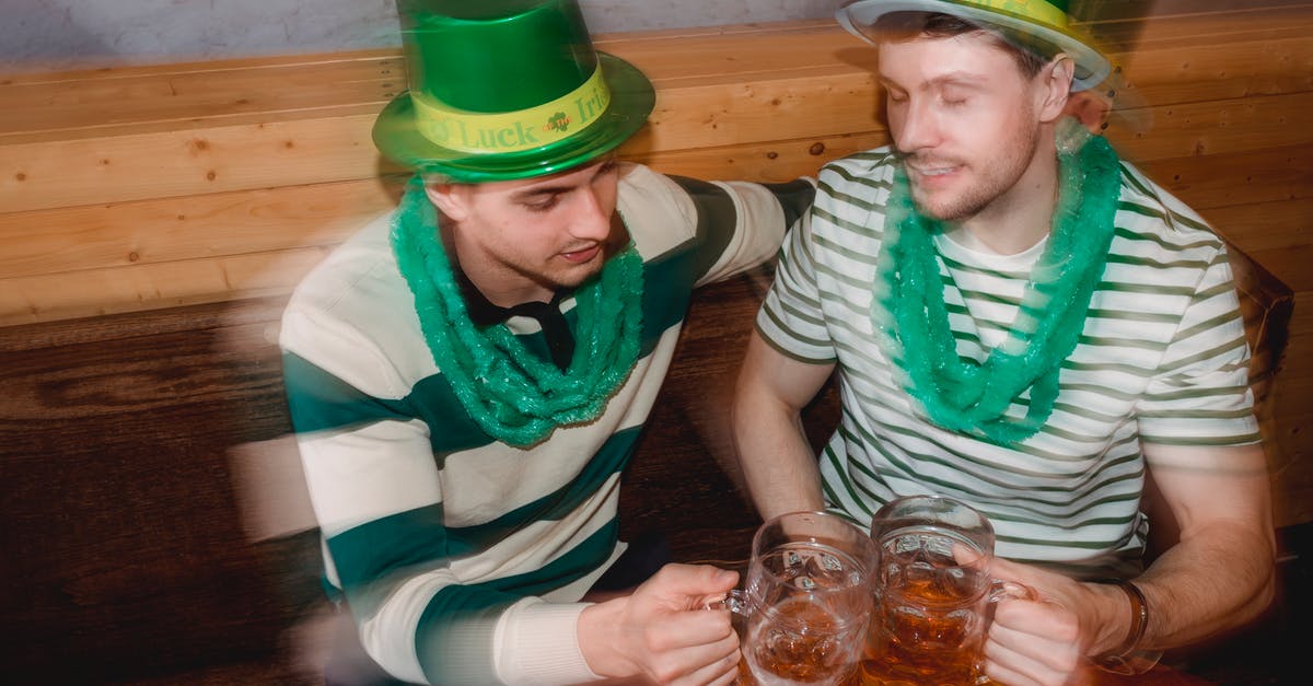 Drunk/Damned mechanics: how do they interact? - Drunk friends with beer celebrating St Patricks Day in pub
