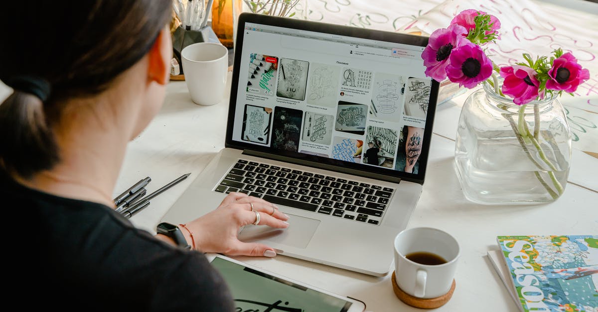 Duplicating heads in Creative doesn't work on Mac - Photo Of Person Using Laptop For Graphic Designs 