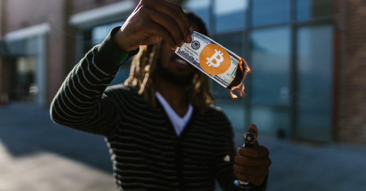 Duration of money burning on the third day of firestarter? - Man Burning a 100 Dollar Bill