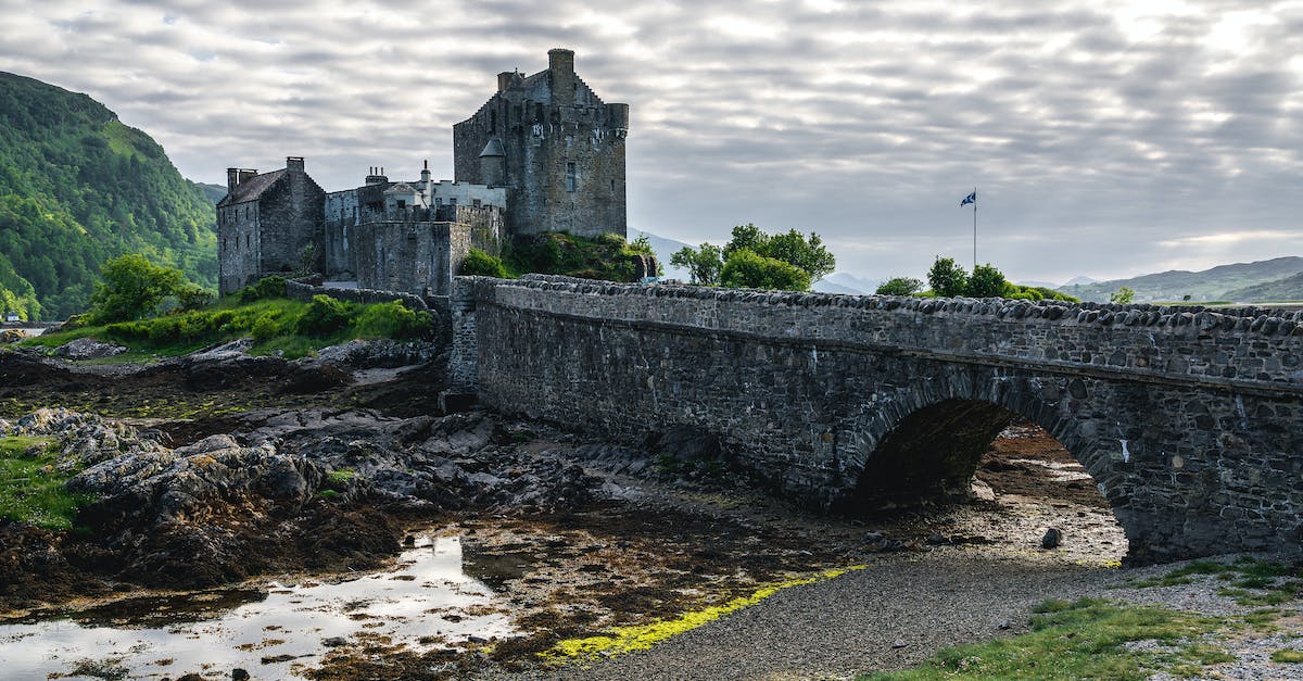 Dwarf Fortress: unable to dig because of damp stone? - Scenic View of a Castle and a Stone Bridge over a River Dwarf Fortress: unable to dig because of damp stone? - Scenic View of a Castle and a Stone Bridge over a River