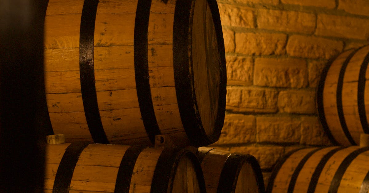 Dwarves not drinking booze in barrels right next to them - Stack of wine barrels in cellar Dwarves not drinking booze in barrels right next to them - Stack of wine barrels in cellar