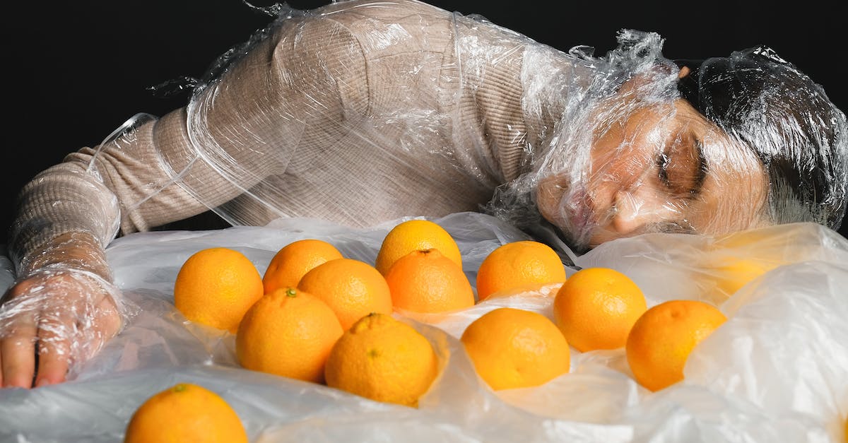Dying in Dead Island - Woman Covered in Clear Plastic
