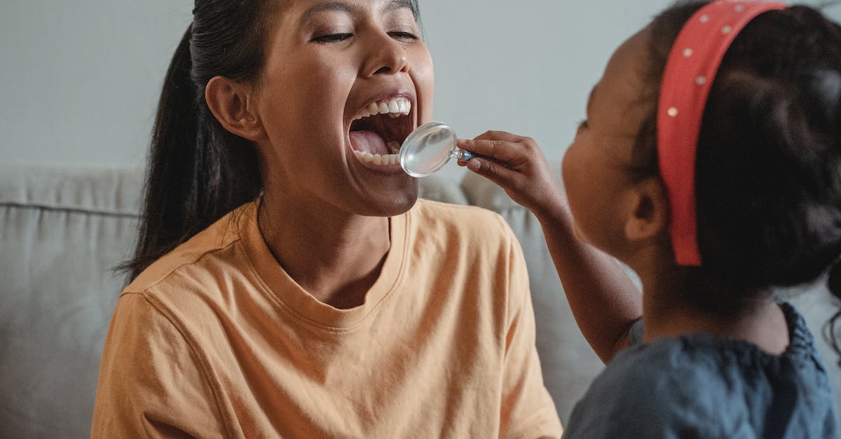 Early Game Extra Utilities Generators? - Crop Asian mother and daughter playing dentist game together
