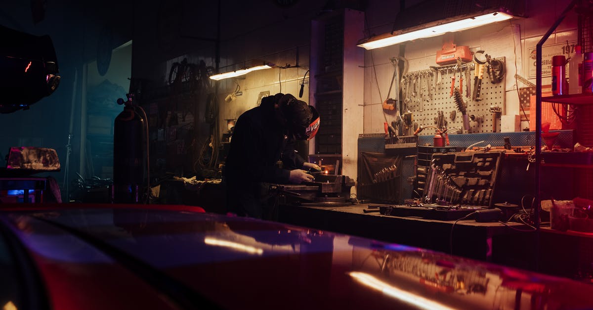 Easily scrap large amounts of gear - Man in Black Jacket Sitting on Chair