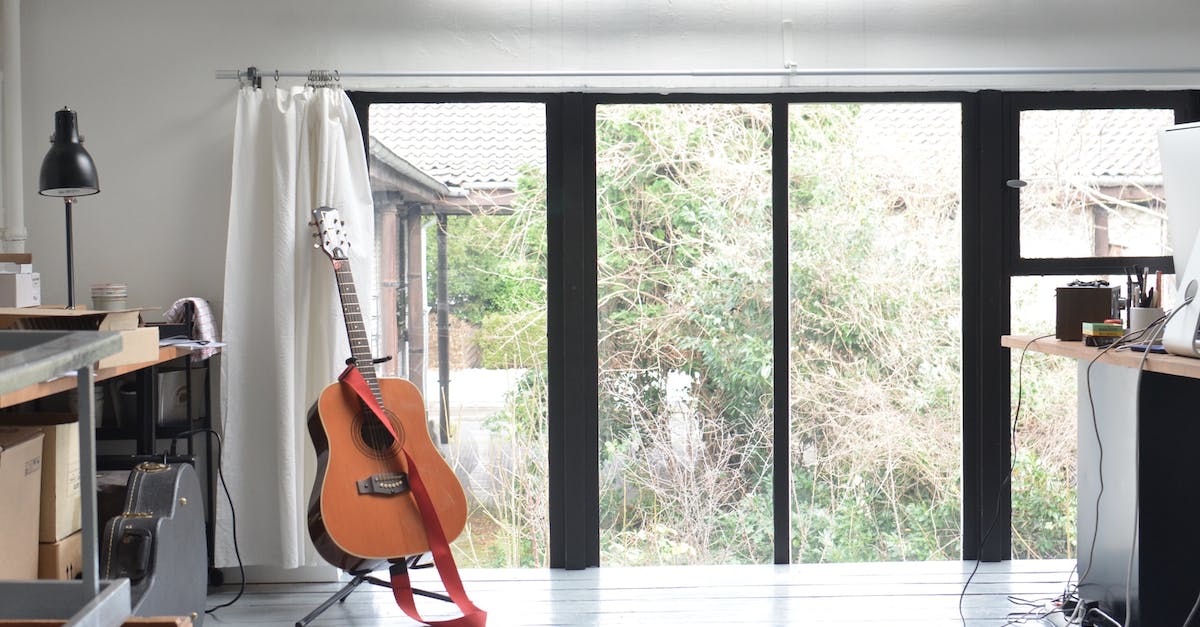 Editing Armor Stand Properties - Interior of room with big glass doors tables and guitar on floor stand Editing Armor Stand Properties - Interior of room with big glass doors tables and guitar on floor stand